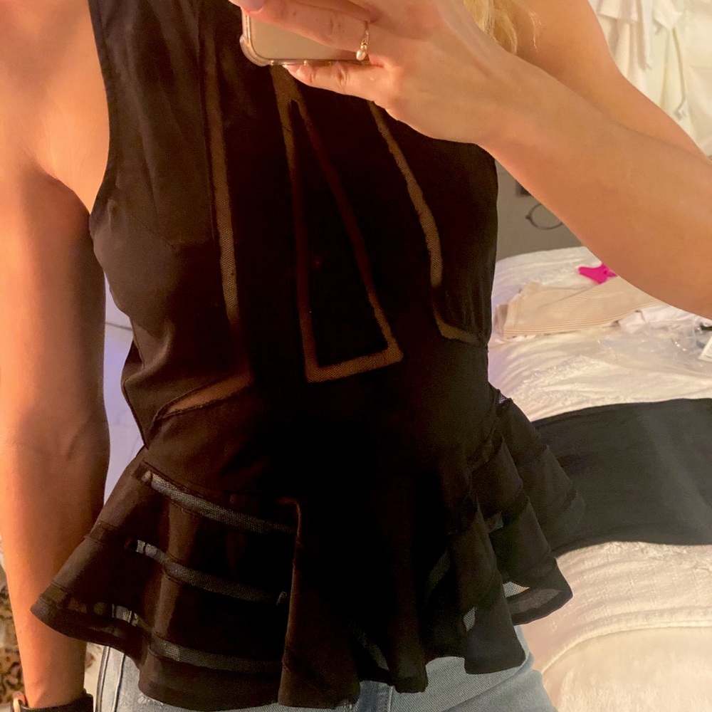 Black peplum shirt